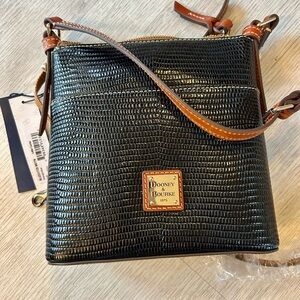 Dooney & Bourke NWT midnight blue letter Carrier crossbody bag. 8x9”